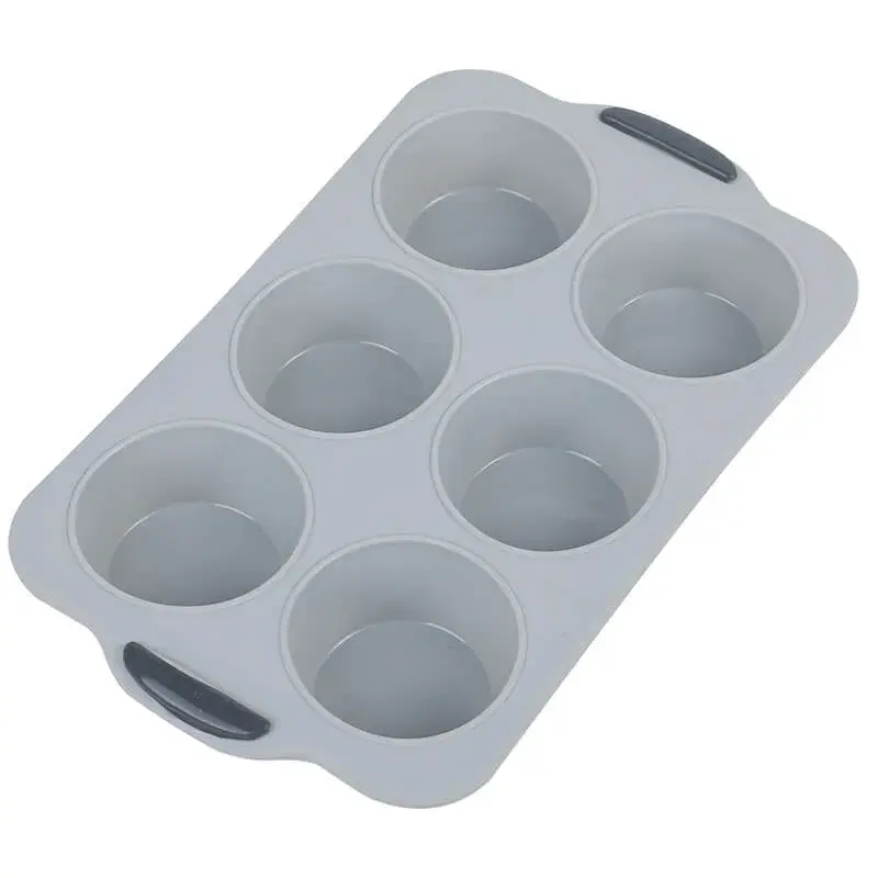 Produktfoto af Conzept muffinsform i hvid silikone med seks huller i en metalramme